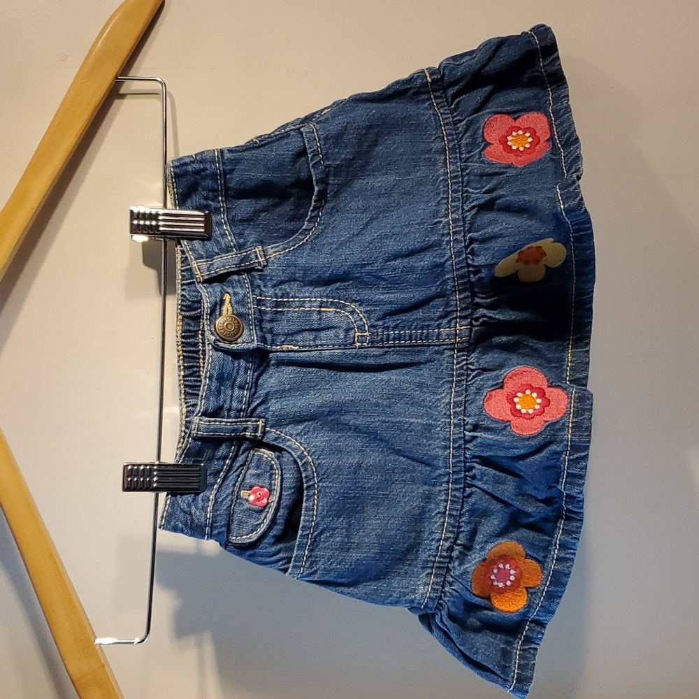 Denim skirt with flower embroidery